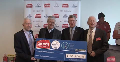 Chemist Warehouse and AFL Coaches Association present a $50,000 cheque to the Australian Prostate Cancer Research Society